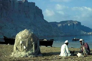 Fishermen, nets and boats Gwadar Bay, Makiran Coast of Pakistan in 1981 Picture by Christine Osborne